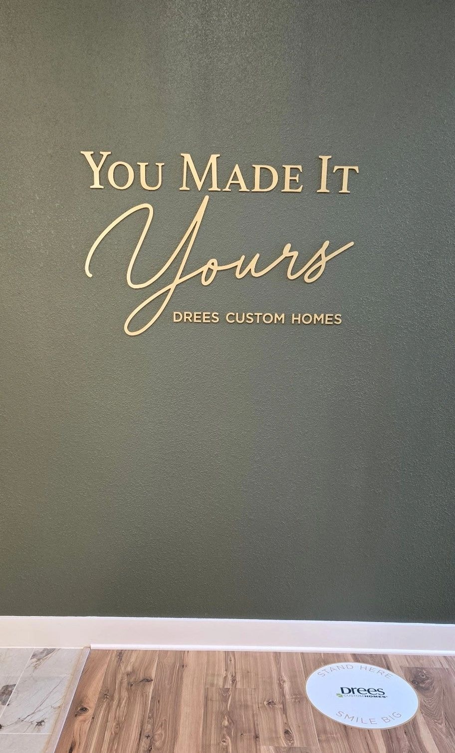 Interior wall signage with gold lettering
